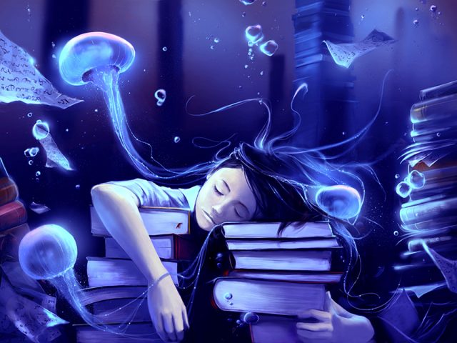 Menina a sonhar, deitada sobre livros